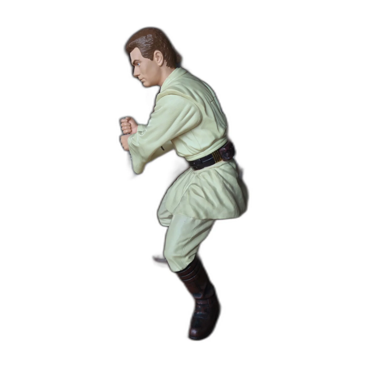 Profil de la figurine de collection Obi-Wan Kenobi montrant les détails de la tunique Jedi