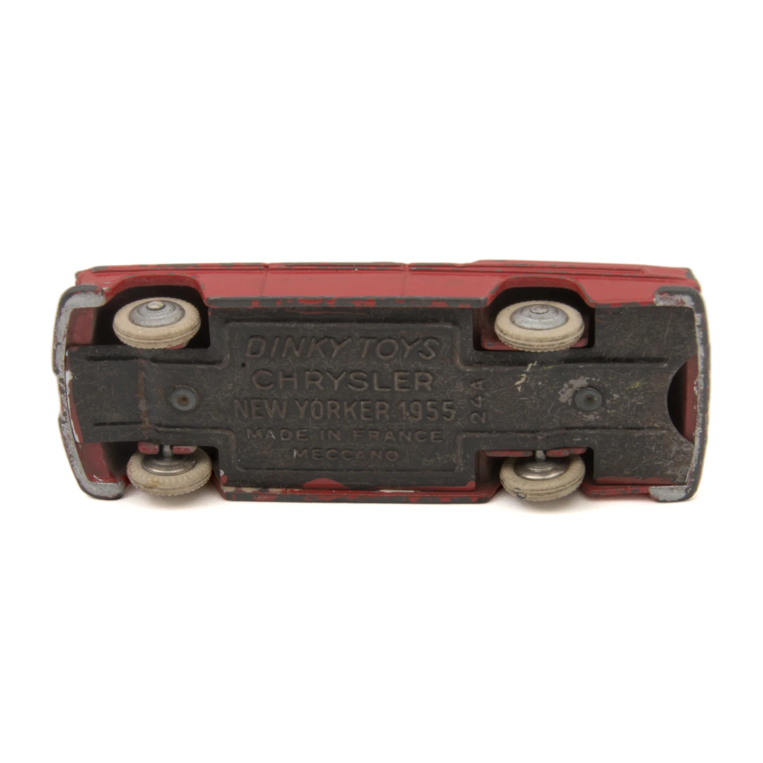Châssis de la voiture miniature Dinky Toys 24A Chrysler New Yorker avec inscriptions Meccano France