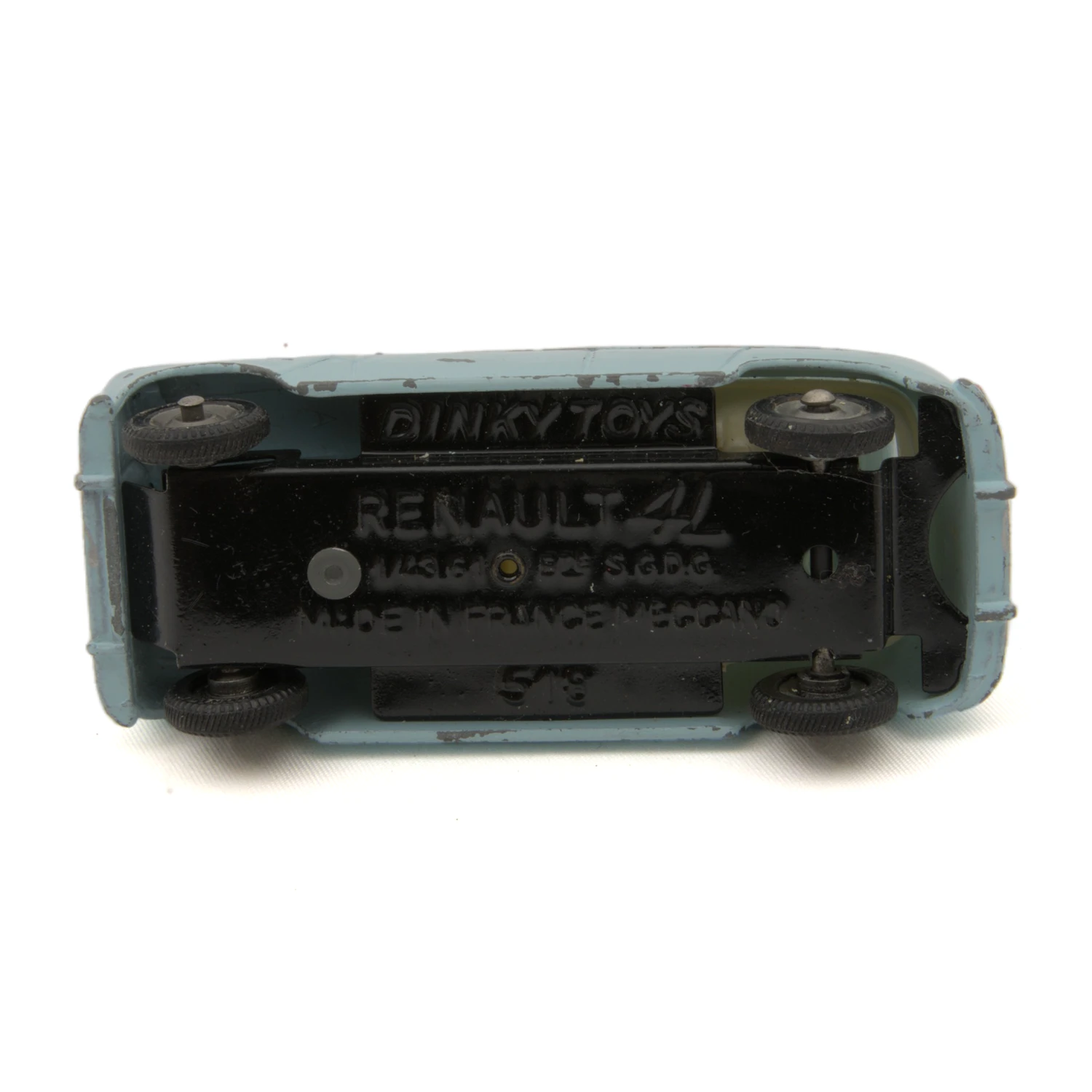 Châssis de la miniature Dinky Toys Renault 4L avec inscriptions Meccano France et référence 518
