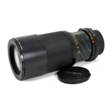Objectif Minolta MD 75-200mm f/4.5 de profil avec bouchon