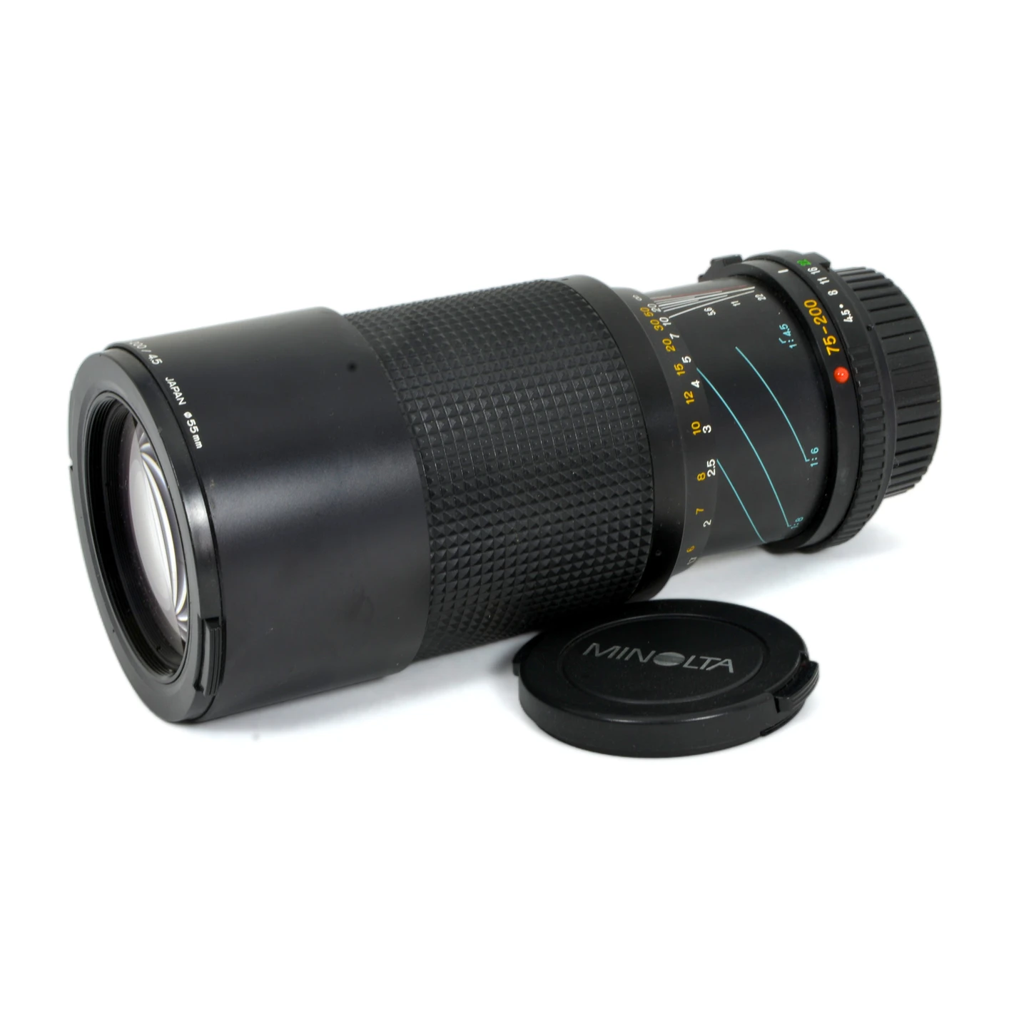 Objectif Minolta MD 75-200mm f/4.5 de profil avec bouchon