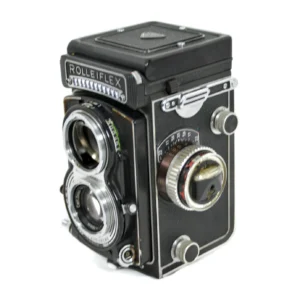Appareil photo argentique Rolleiflex T de face avec objectifs Carl Zeiss