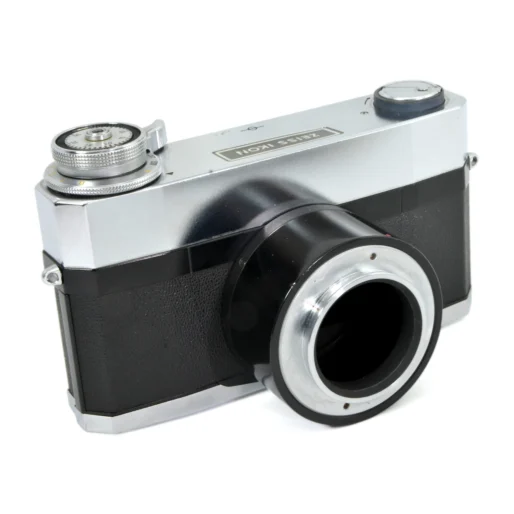 Vue de trois quarts face du boîtier scientifique Zeiss Ikon Contarex avec son adaptateur pour microscope