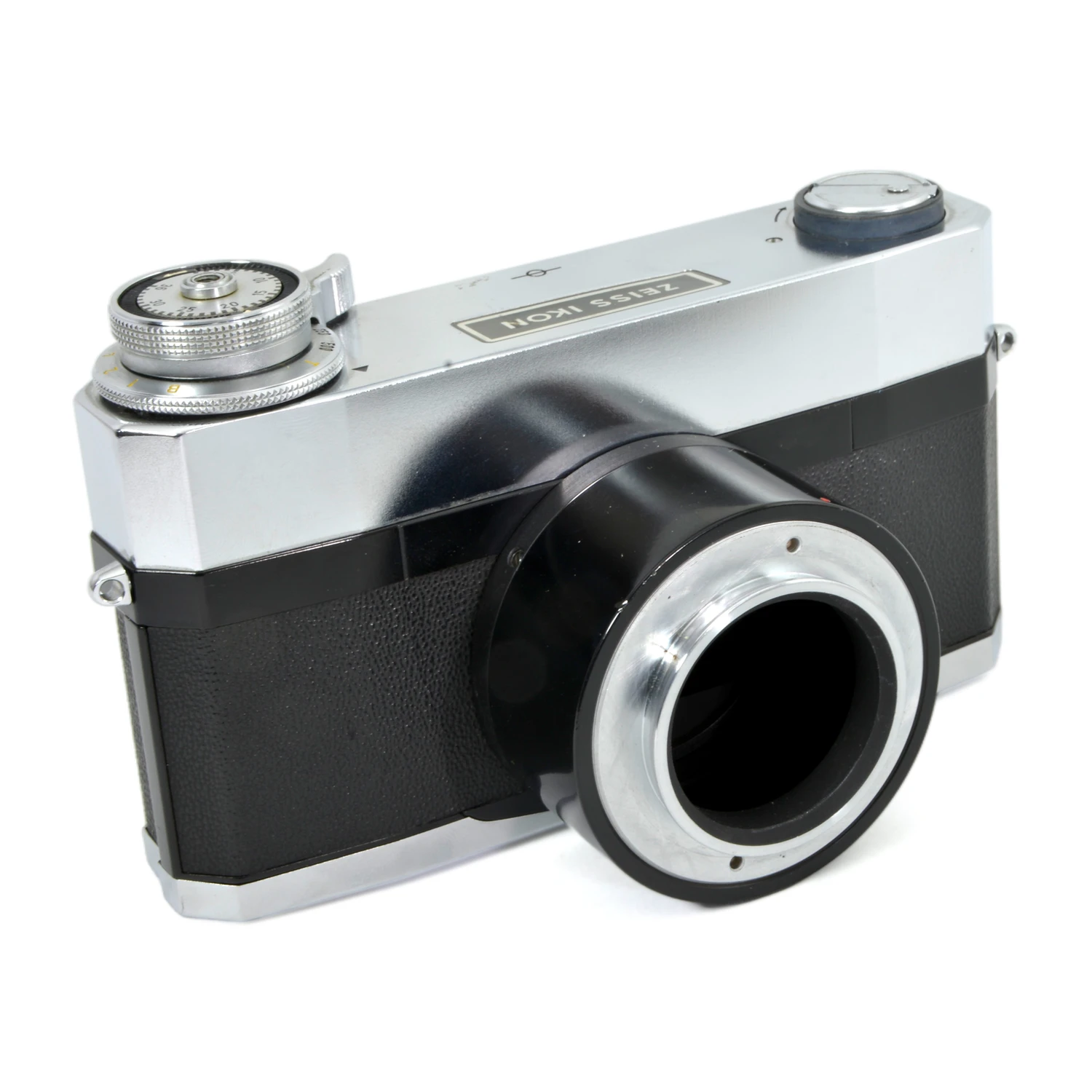 Vue de trois quarts face du boîtier scientifique Zeiss Ikon Contarex avec son adaptateur pour microscope