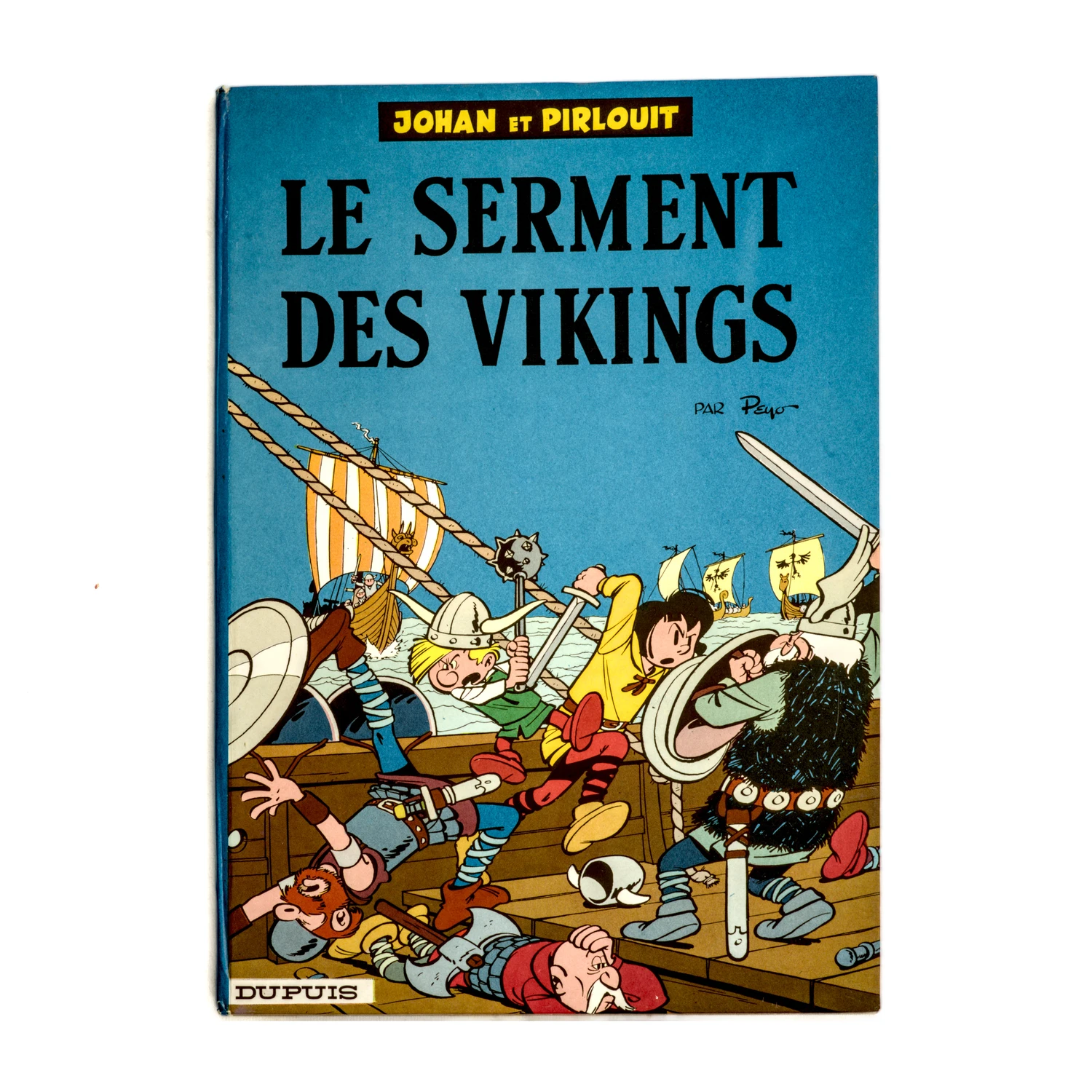 Couverture de la bande dessinée Johan et Pirlouit Le Serment des Vikings par Peyo
