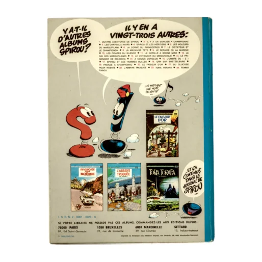 Dos de l'album Spirou N°18 listant les autres titres de la collection