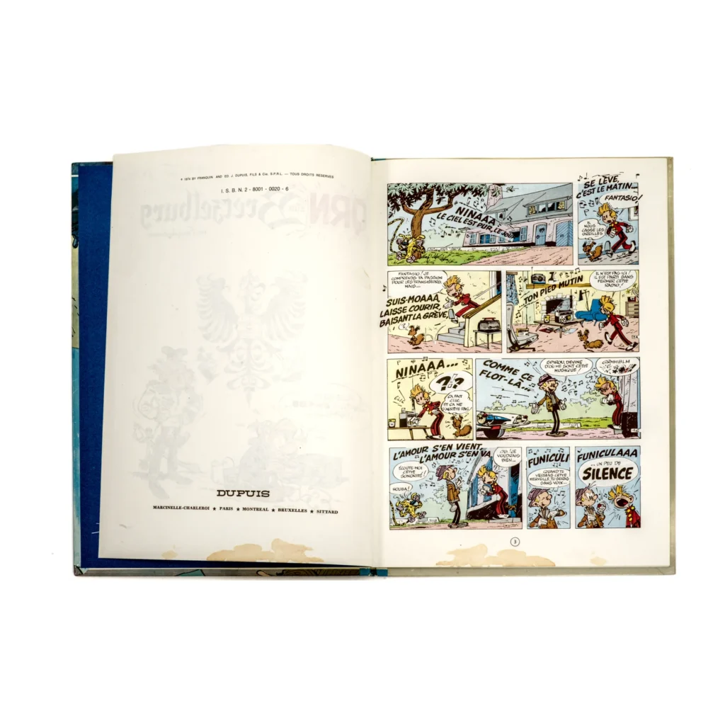 Page intérieure de la BD montrant l'année d'édition 1974 et des taches d'humidité en bas de page