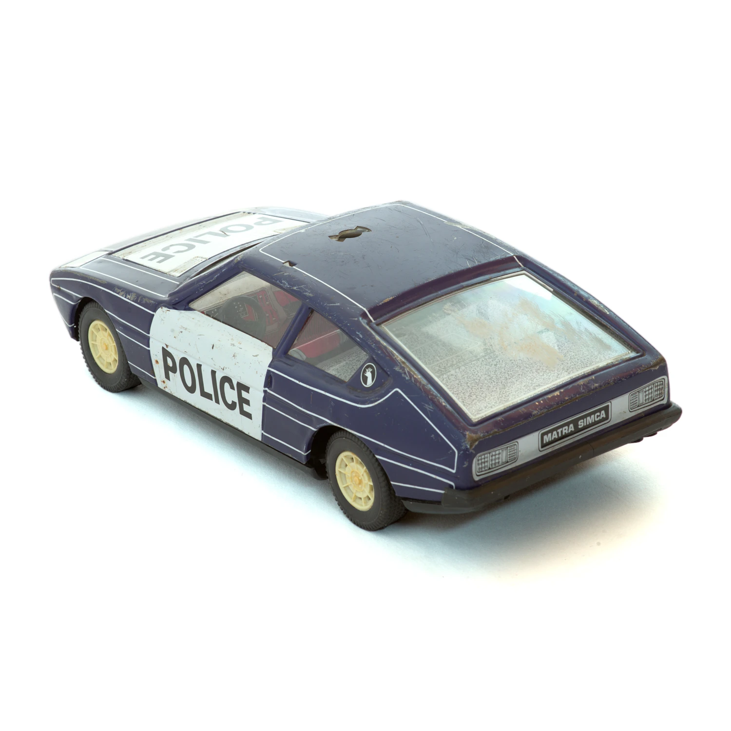 Vue de trois quarts arrière de la voiture de police miniature Matra Simca Bagheera montrant l
