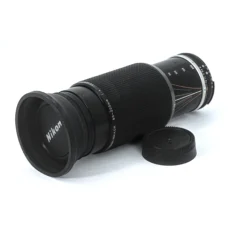 Objectif Nikon Zoom-NIKKOR 80-200mm f/4 AI-S avec pare-soleil et bouchon