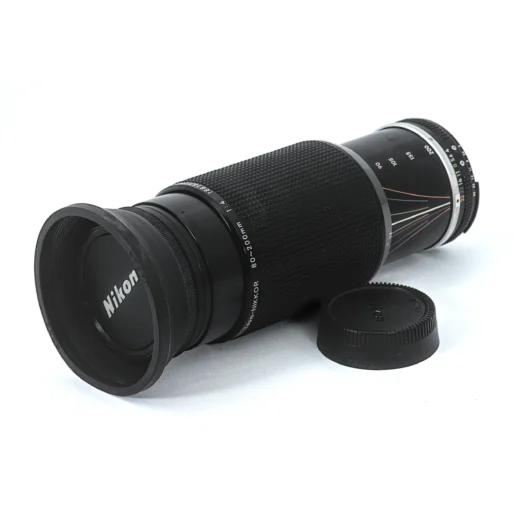 Objectif Nikon Zoom-NIKKOR 80-200mm f/4 AI-S avec pare-soleil et bouchon