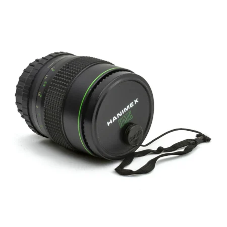 Objectif Hanimex HMC 135mm f/2.8 avec son bouchon avant