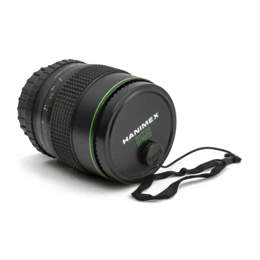 Objectif Hanimex HMC 135mm f/2.8 avec son bouchon avant