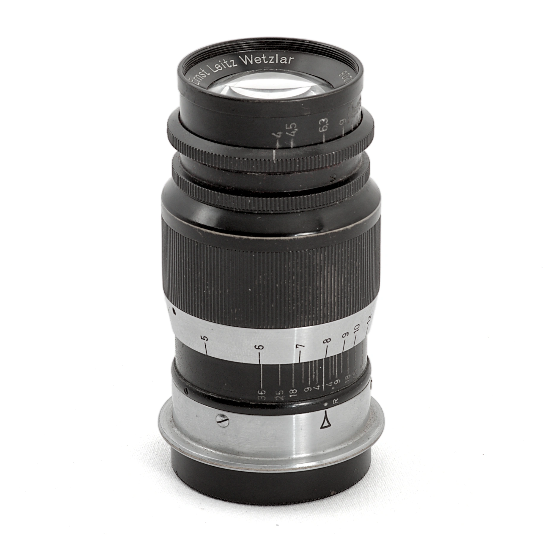 Objectif Leica Ernst Leitz Wetzlar Elmar 9cm f/4 de face avec échelle de profondeur de champ
