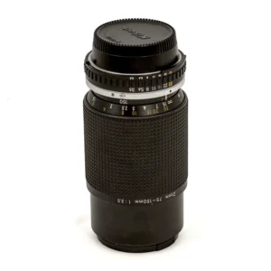 Objectif Nikon Zoom 75-150mm f/3.5 vu de profil avec son bouchon