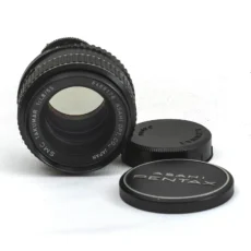 Lentille frontale de l'objectif SMC Takumar 55mm f/1.8 avec ses bouchons d'origine