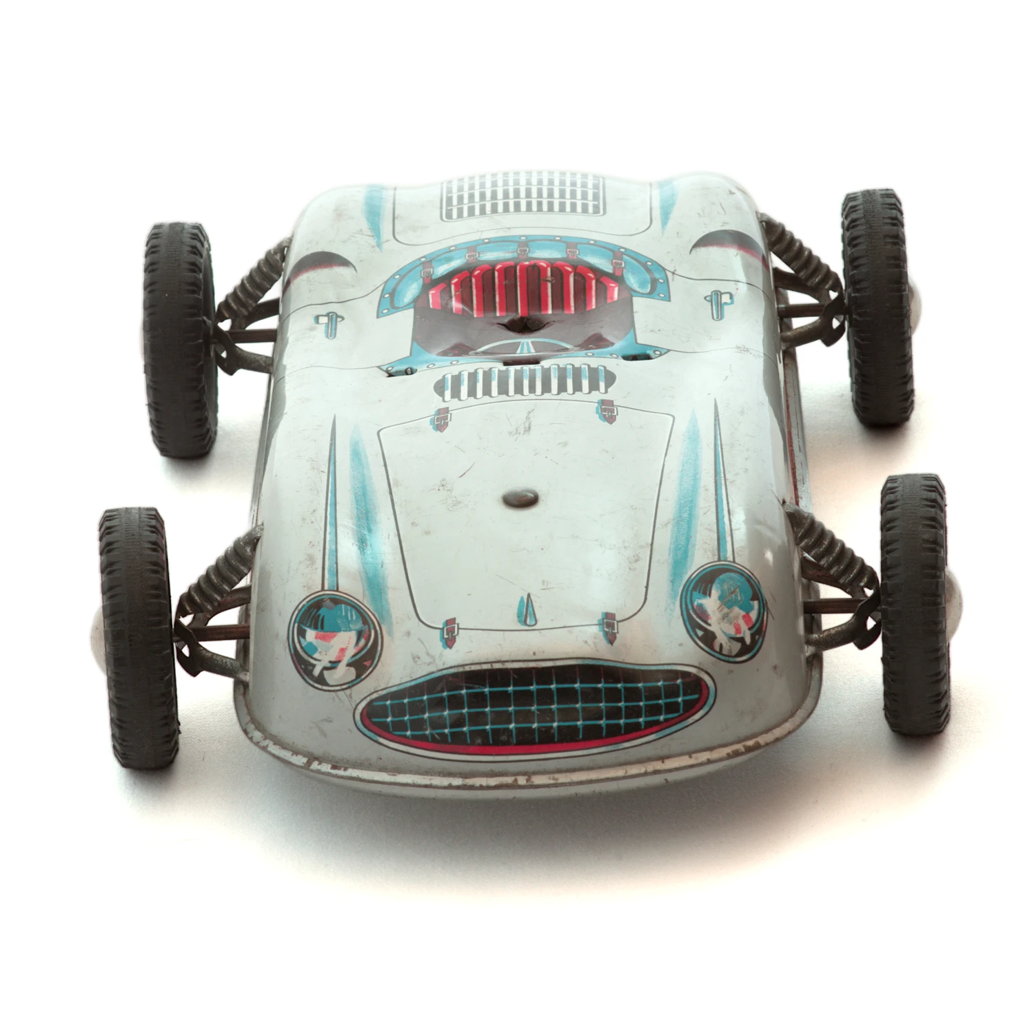 Vue de face de la voiture de course en tôle avec calandre et phares lithographiés