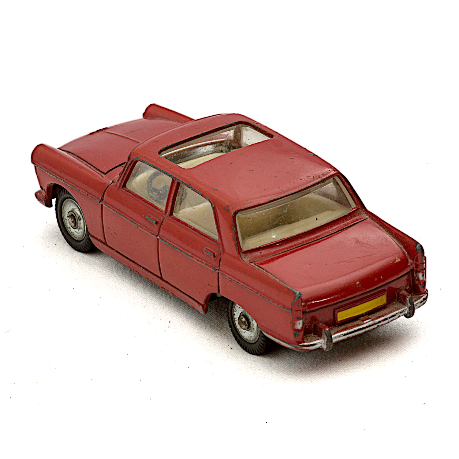 Vue de dessus de la miniature Peugeot 404 Dinky Toys avec toit ouvrant