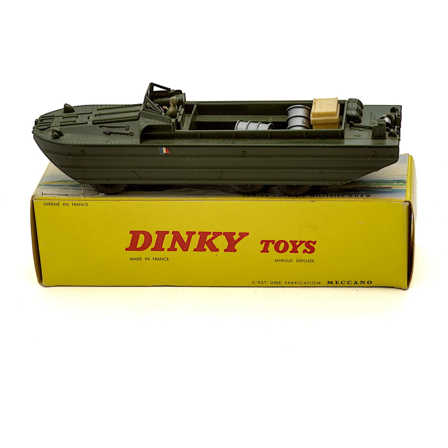 Miniature DUKW Dinky Toys 825 posée sur sa boîte jaune d