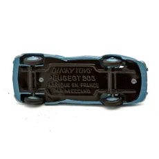 Châssis noir de la miniature Dinky Toys Peugeot 203 avec inscriptions Meccano France