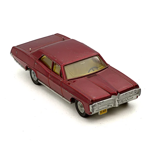 Voiture miniature Dinky Toys Pontiac Parisienne rouge vue de face