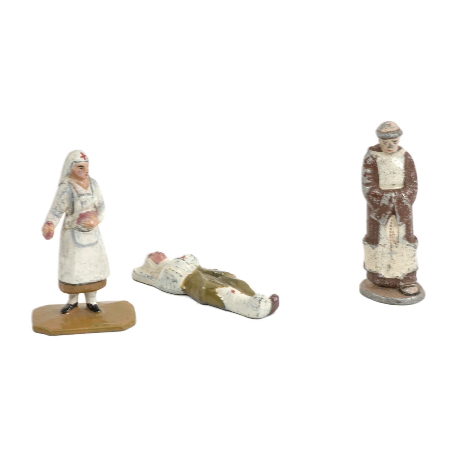 Lot de 3 figurines anciennes en plomb peint représentant une infirmière