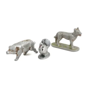 Lot de 3 petites figurines anciennes en plomb représentant un cochon