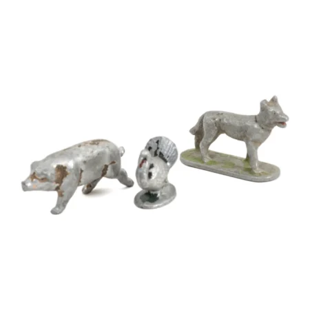 Lot de 3 petites figurines anciennes en plomb représentant un cochon