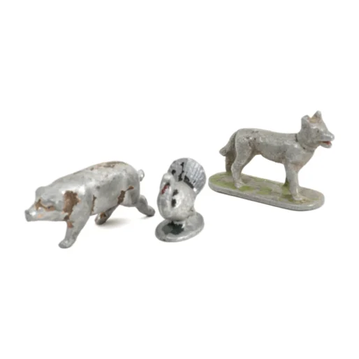 Lot de 3 petites figurines anciennes en plomb représentant un cochon