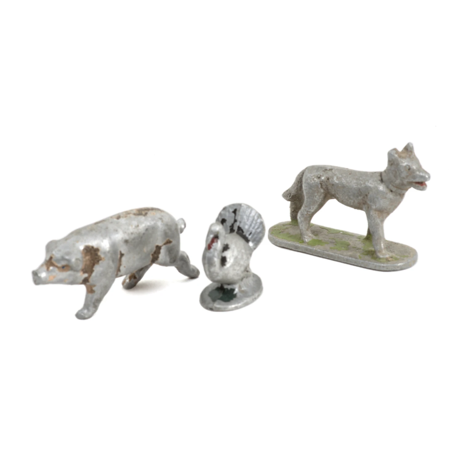 Lot de 3 petites figurines anciennes en plomb représentant un cochon