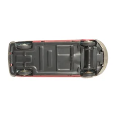 Dessous du châssis en métal noir de la voiture miniature Joustra