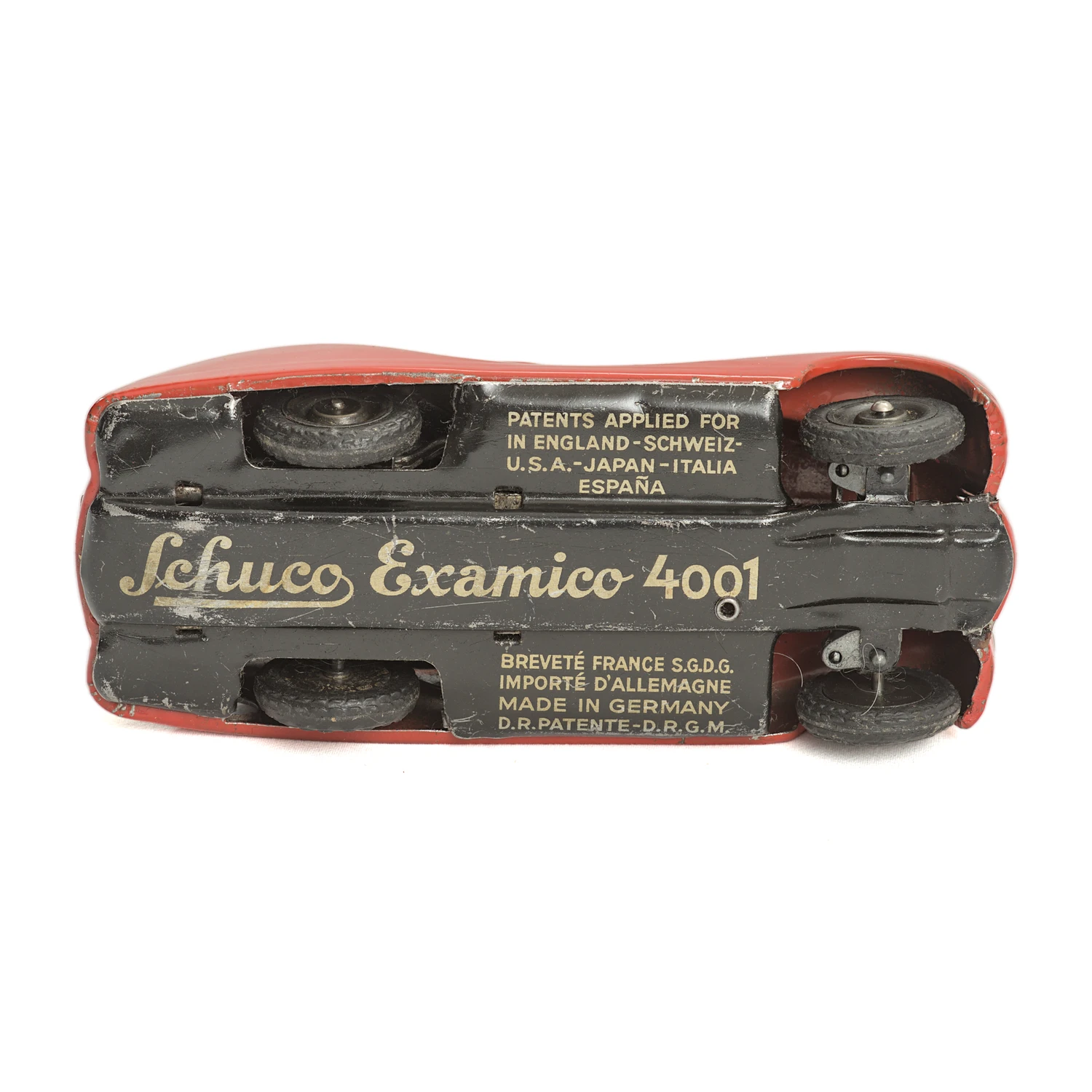 Châssis de la voiture Schuco Examico 4001 avec inscriptions Made in Germany et brevets D.R.G.M.