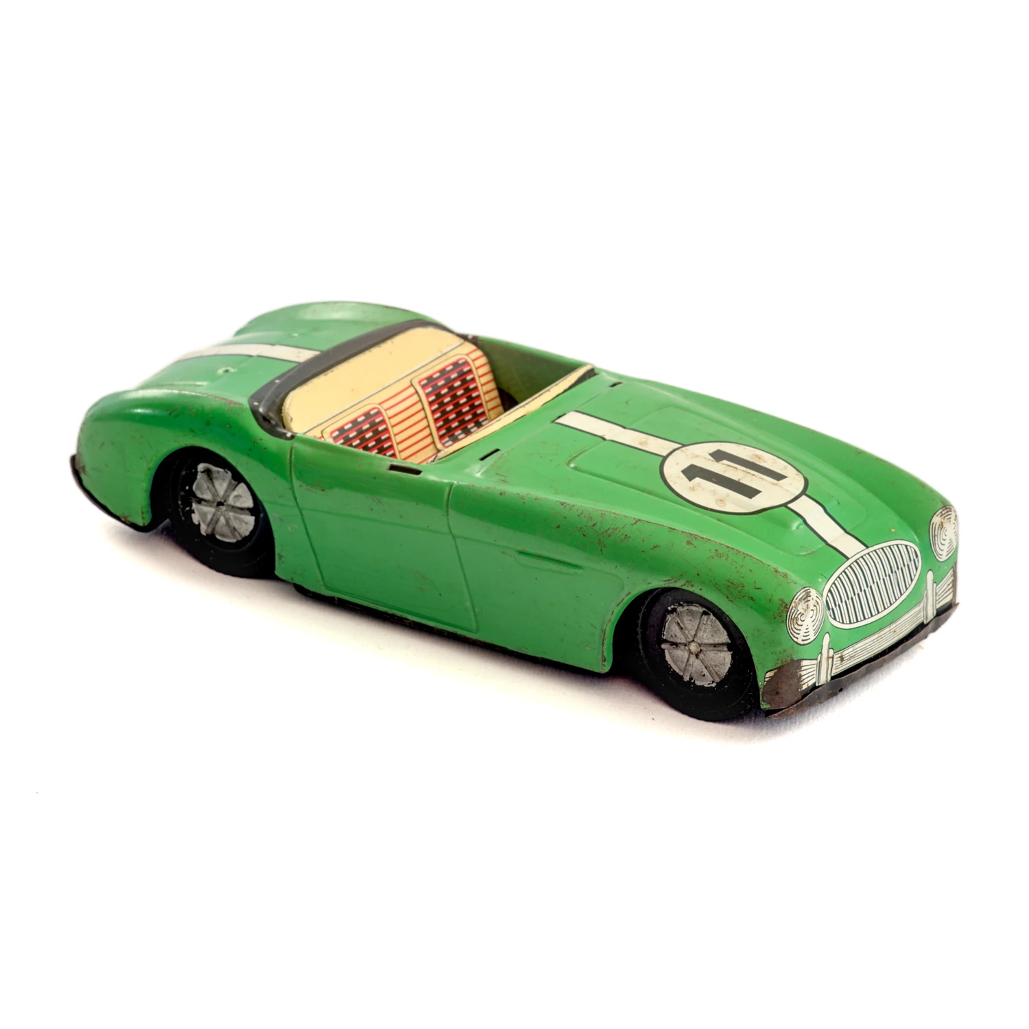 Voiture de course ancienne Joustra en tôle verte avec le numéro 11